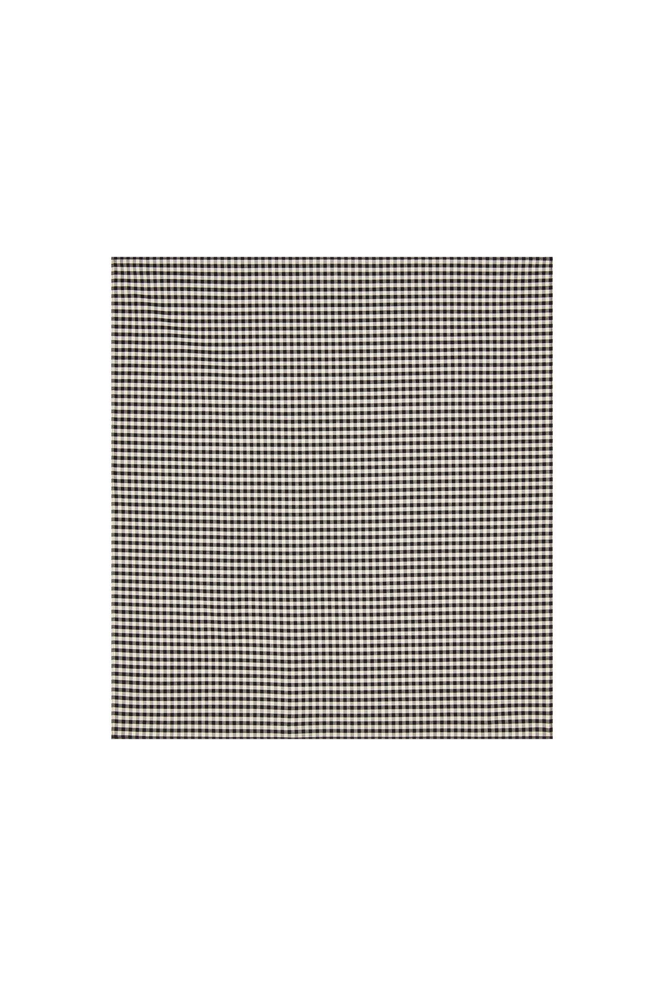 Black-and-white gingham check fabric square centered on white background