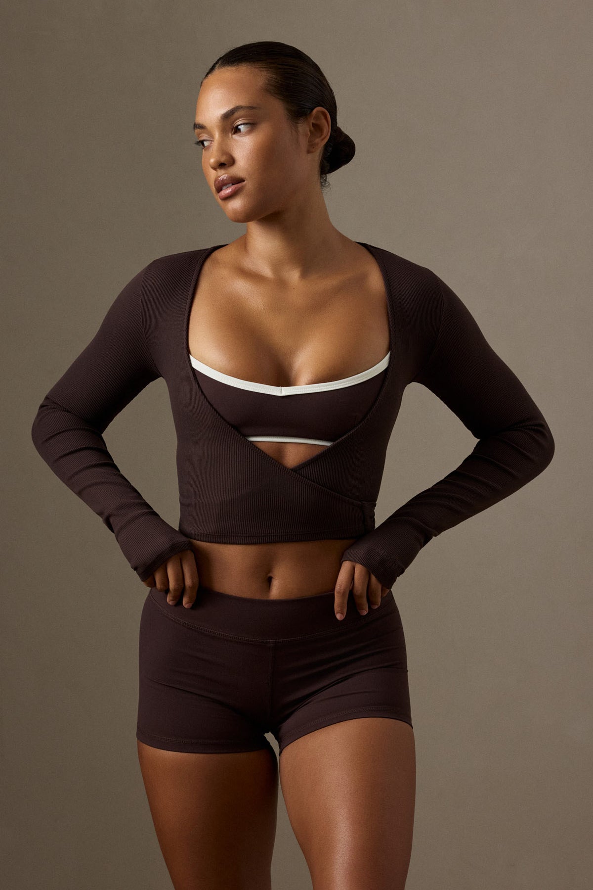 Front view of Soho Bra in Espresso and Ivory showcasing V neckline and color block trim on a model