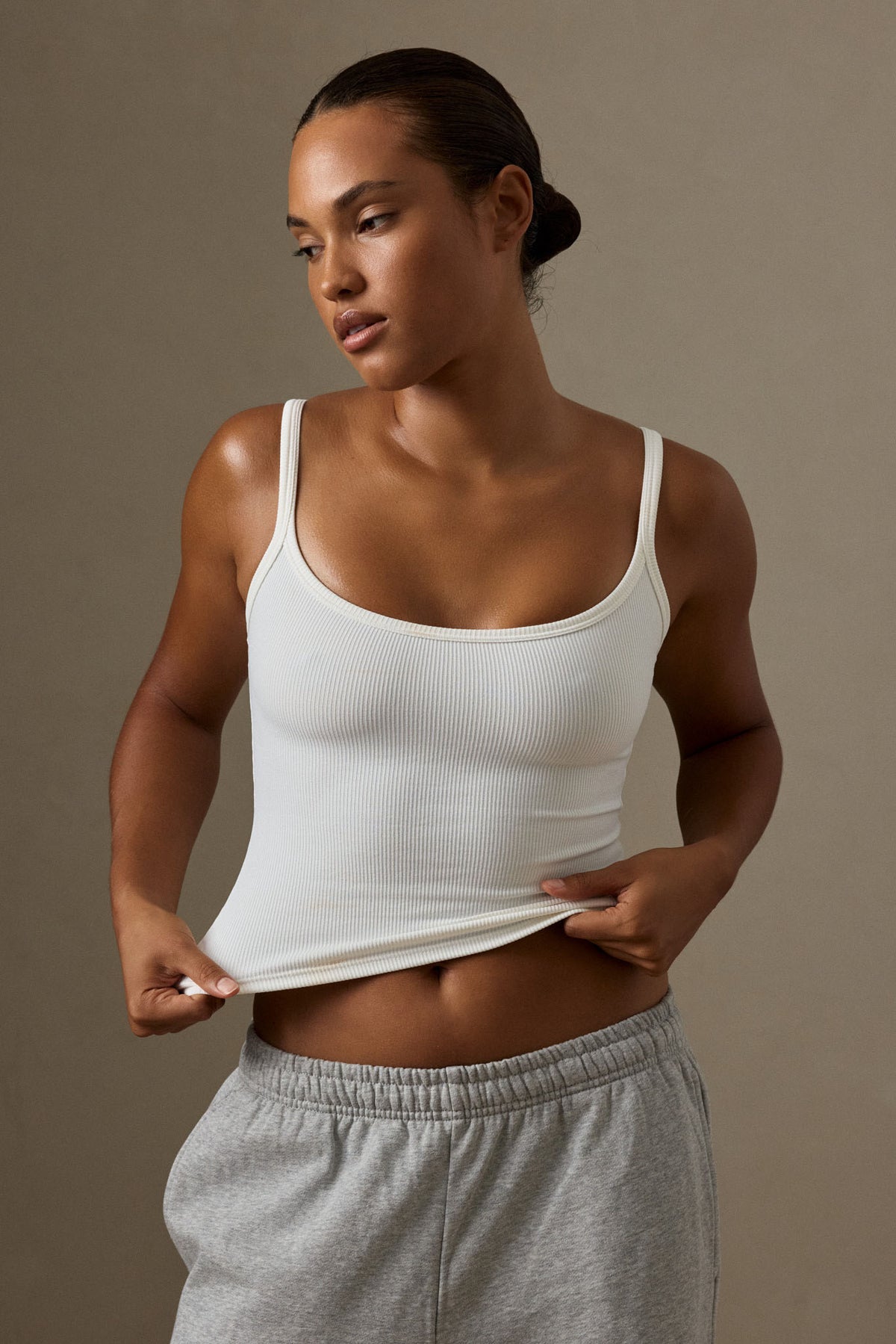 Front view of Devin Tank in White Thin Rib showcasing scoop neckline and thin rib texture on a model against a neutral background