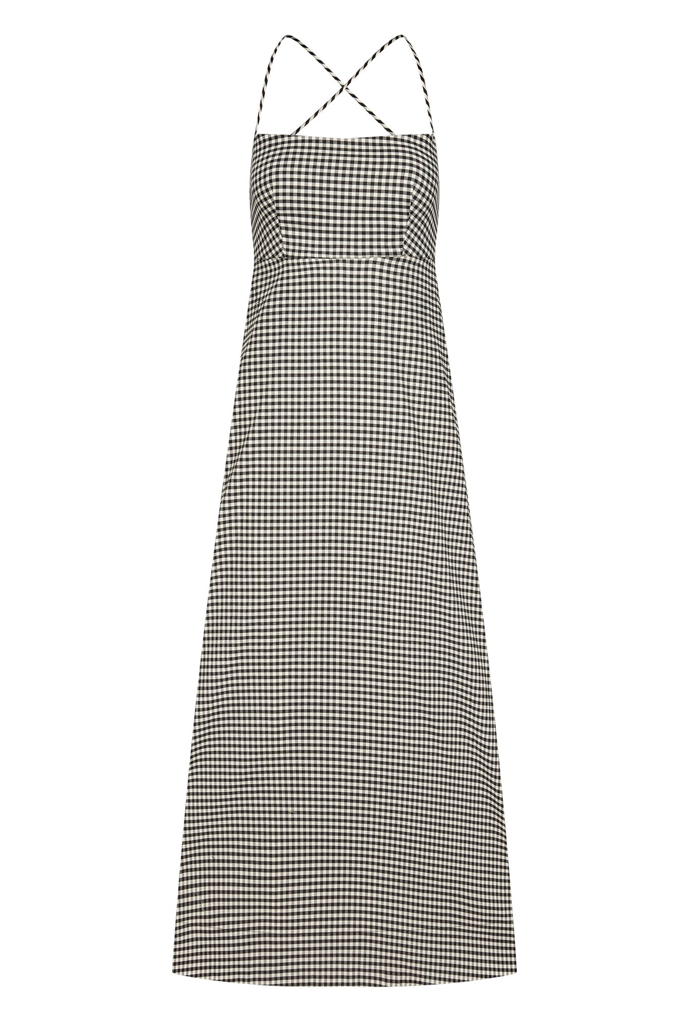 Black-and-white gingham maxi dress with square neckline, fitted bodice and crossed thin spaghetti straps.