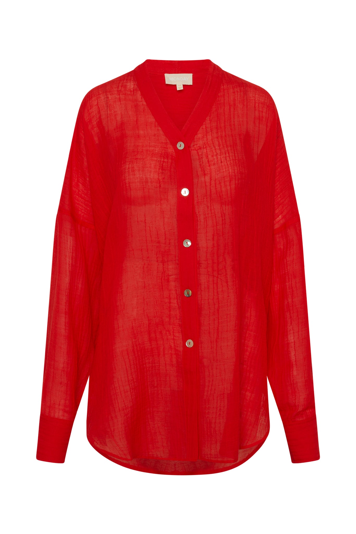Front view of Barcelona Tunic in Chili Pepper crinkle linen showing sheer oversized fit, seashell buttons, long sleeves, and crinkle texture on white background