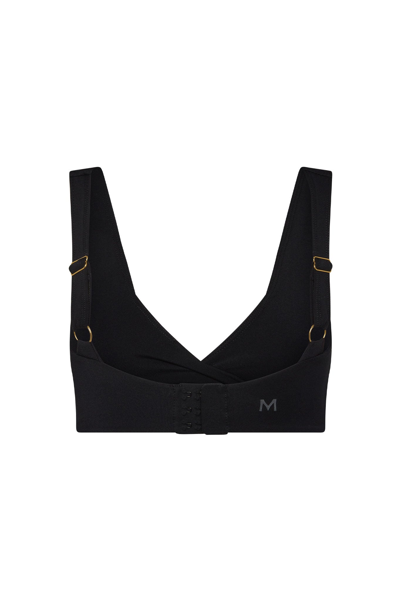 Black bralette with V-back and center hook-and-eye closure, adjustable straps with gold hardware, M logo on band