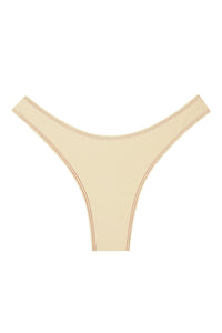 Front of Byron Bottom in Champagne Denim, mid-rise high-cut thong with contrast topstitching on white background