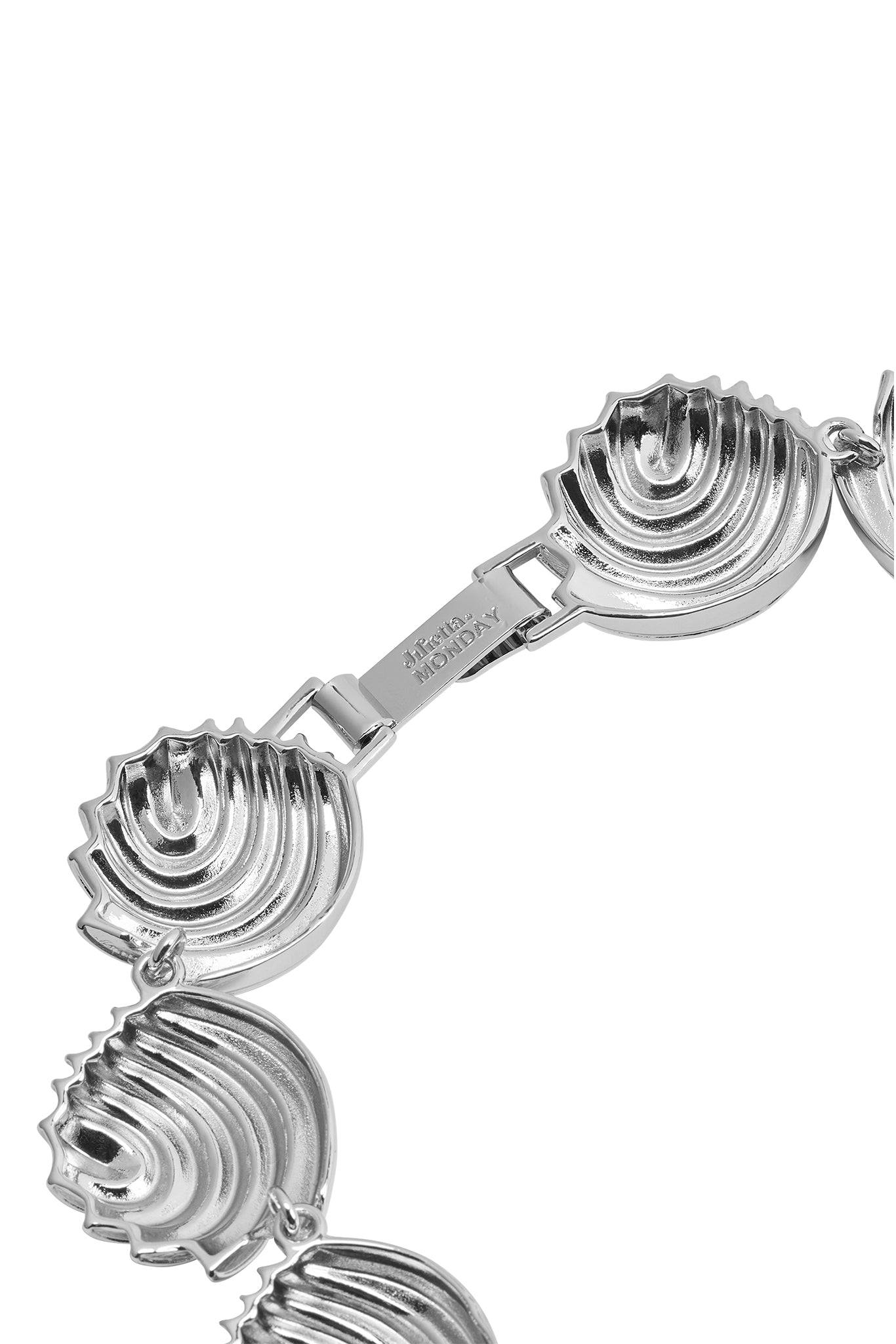 Necklace of linked silver scallop-shell motifs with engraved clasp reading MONDAY.