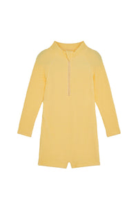 Front view of Hilo One Piece Kids in Honey Crinkle, crinkle textured fabric with long sleeves, front zip, and short legs on white background