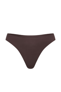 Front view of Invisible Thong in Clove showcasing mid-rise fit and raw-edge seamless finish on white background
