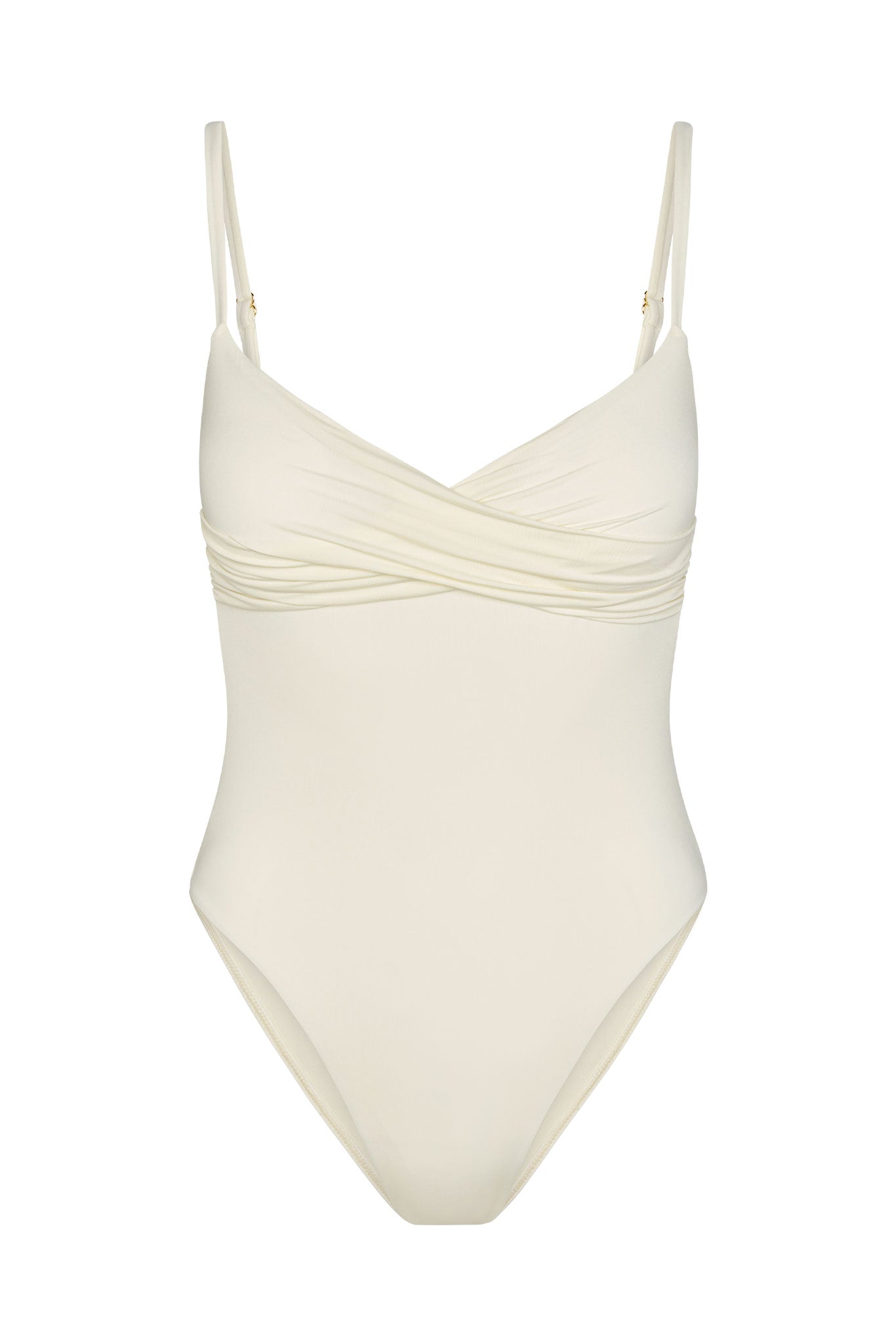 Ivory one-piece swimsuit with ruched crossover bust, adjustable thin shoulder straps, high-cut leg openings.