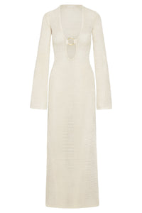 Front view of Montego Dress in ivory knit showcasing deep V with gold O-ring and long bell sleeves on white background