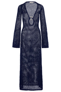 Front view of Montego Dress, midnight crochet, with gold ring detail, plunging neckline and long sleeves on white background