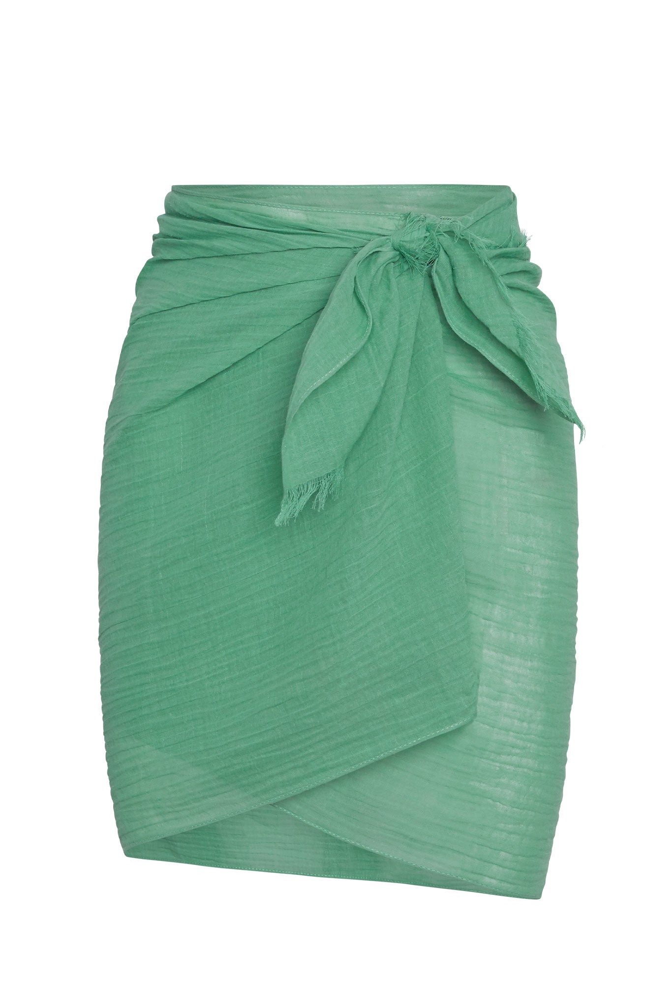Green lightweight wrap skirt with tied side knot and frayed edges, sarong-style knee-length overlay.