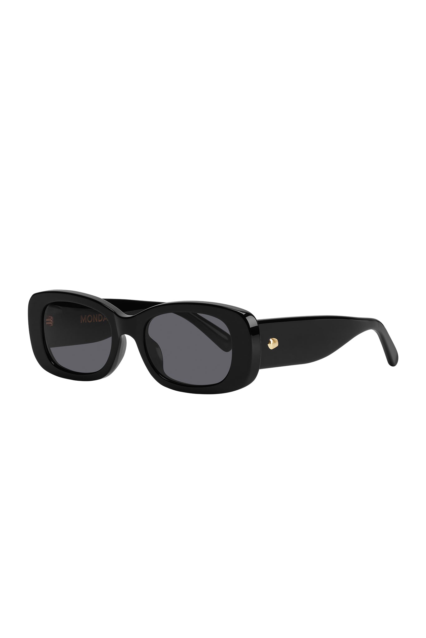 Black chunky rectangular sunglasses with dark lenses and gold rivet; text "MONDAY" inside left temple.
