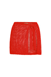 Front view of Santa Marta Sarong in Chili Pepper showing petit crochet open-knit fabric and side tie on white background