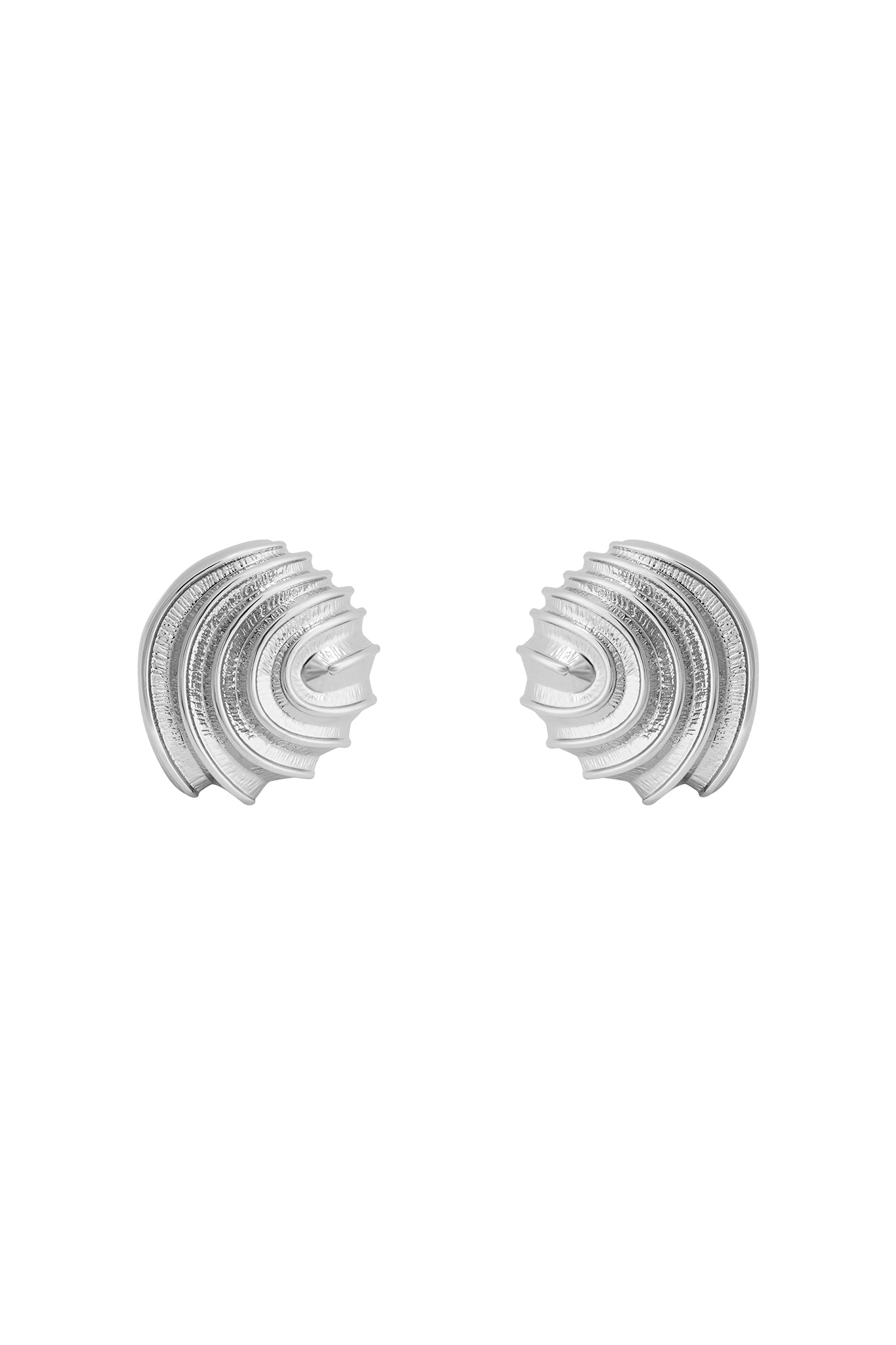 Pair of silver scallop-shaped stud earrings with layered ridged texture on white background.