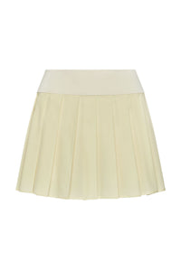 Flat-lay of Wimbledon Skirt in ivory showcasing pleated mini silhouette and wide fitted waistband on white background