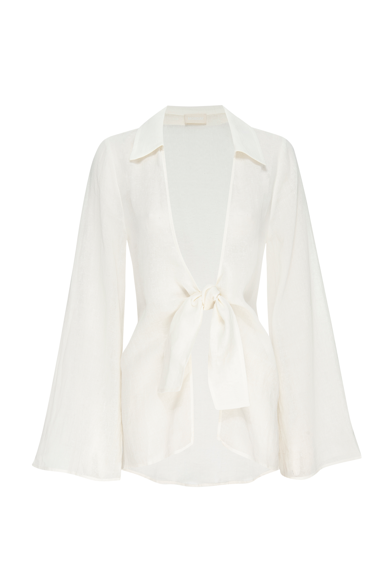 White linen tie-front blouse with open collar, long bell sleeves, waist bow; label at collar reads MONDAY.