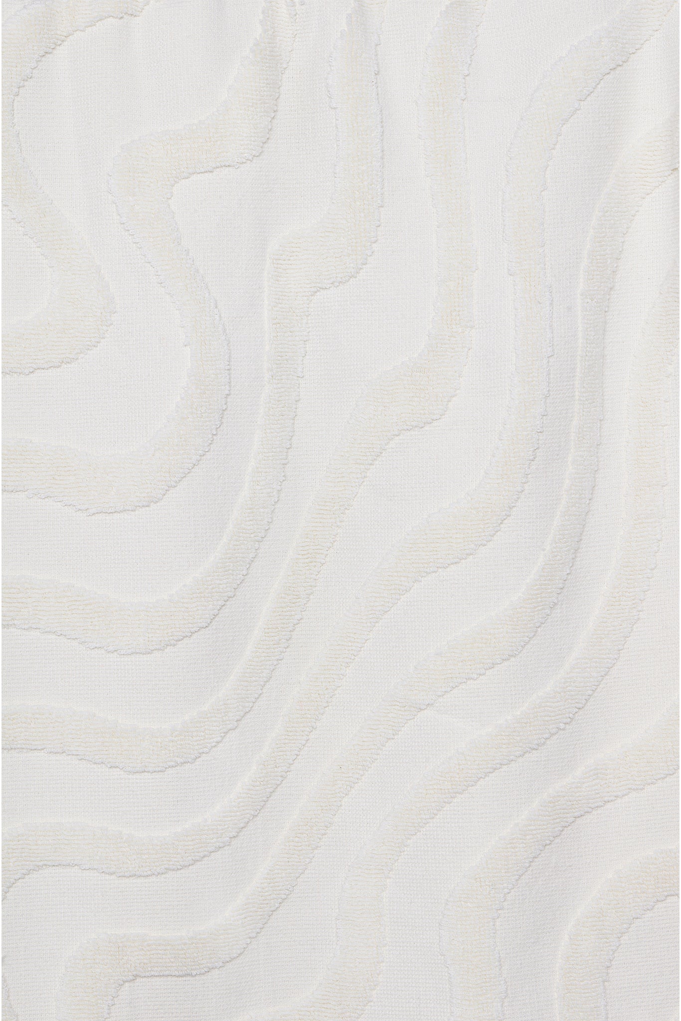 White textured fabric with raised, wavy lines creating a subtle abstract pattern.