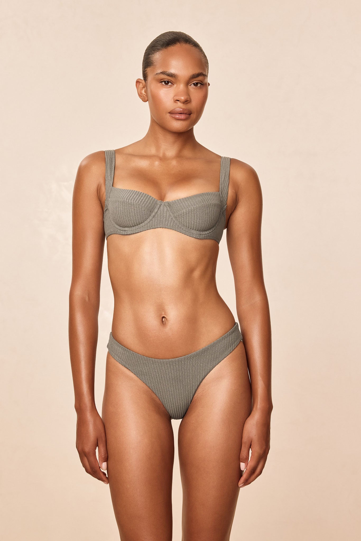 Front view of Sorrento Top in Steel Lurex Rib showing demi underwire cups, adjustable shoulder straps and ribbed lurex texture on a beige studio background