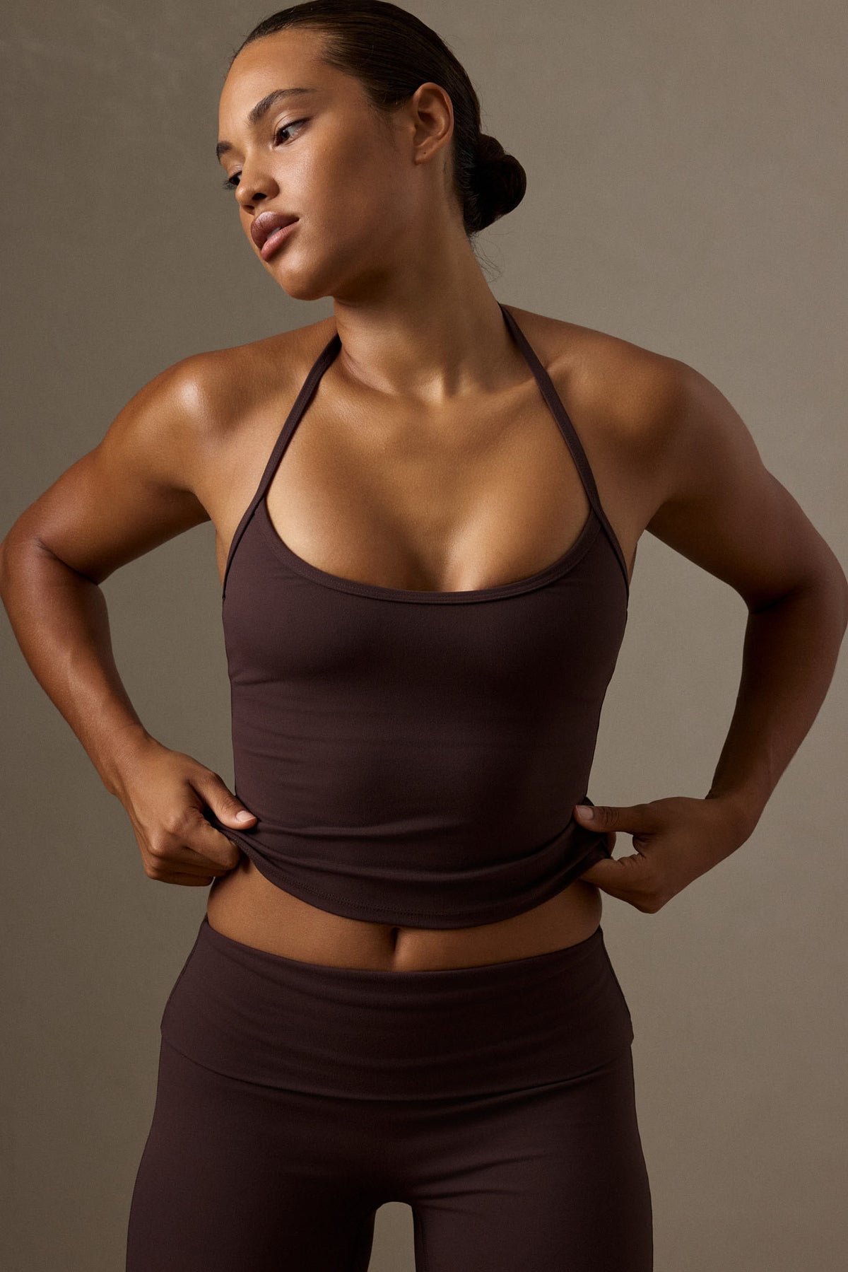 Front view of the Espresso Toronto Tank showcasing its scoop neck and halter straps with a neutral background