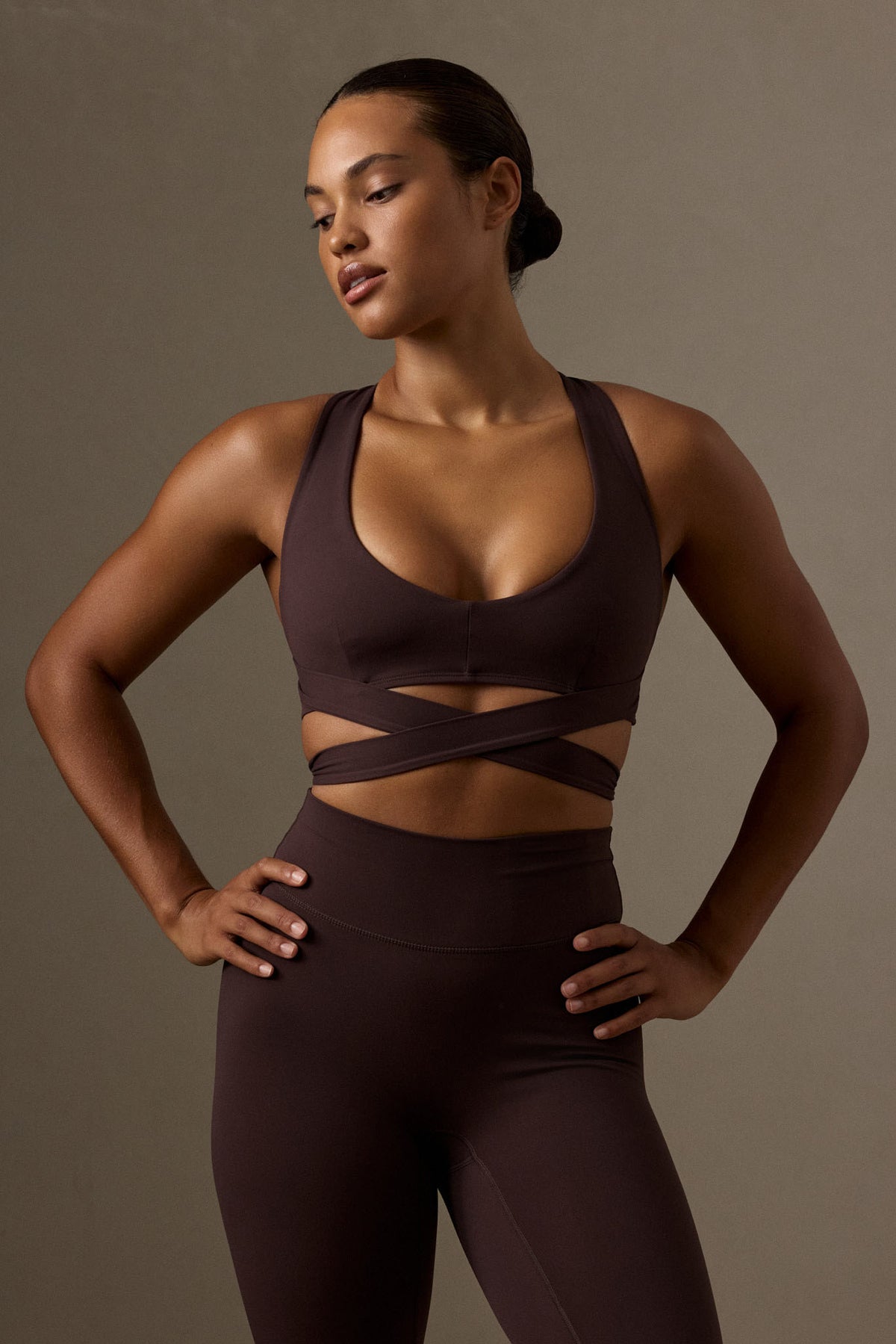 Front view of Hudson Bra in Espresso showcasing the V neck and wraparound straps on a model against a neutral studio background