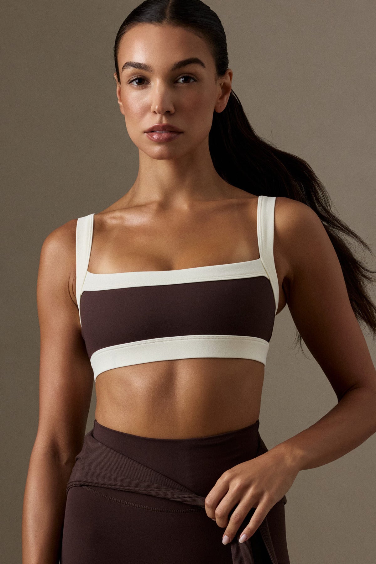 Front view of Outpost Bra in Espresso/Ivory showing straight neck and contrasting ivory trim on a model