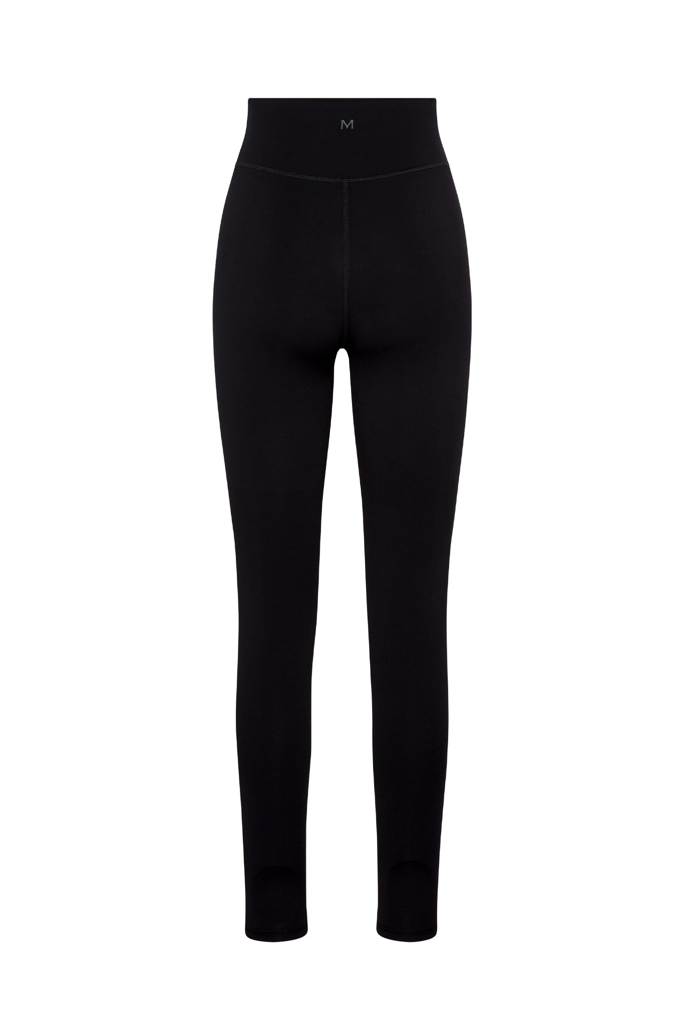 Back view of high-waist black leggings with small M logo on waistband