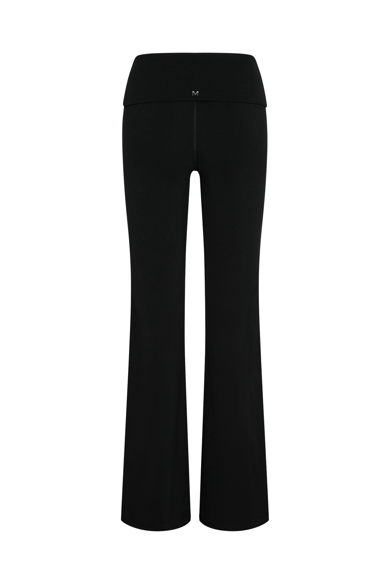 Black high-waist flared yoga pants, back view, with small white M logo centered on waistband
