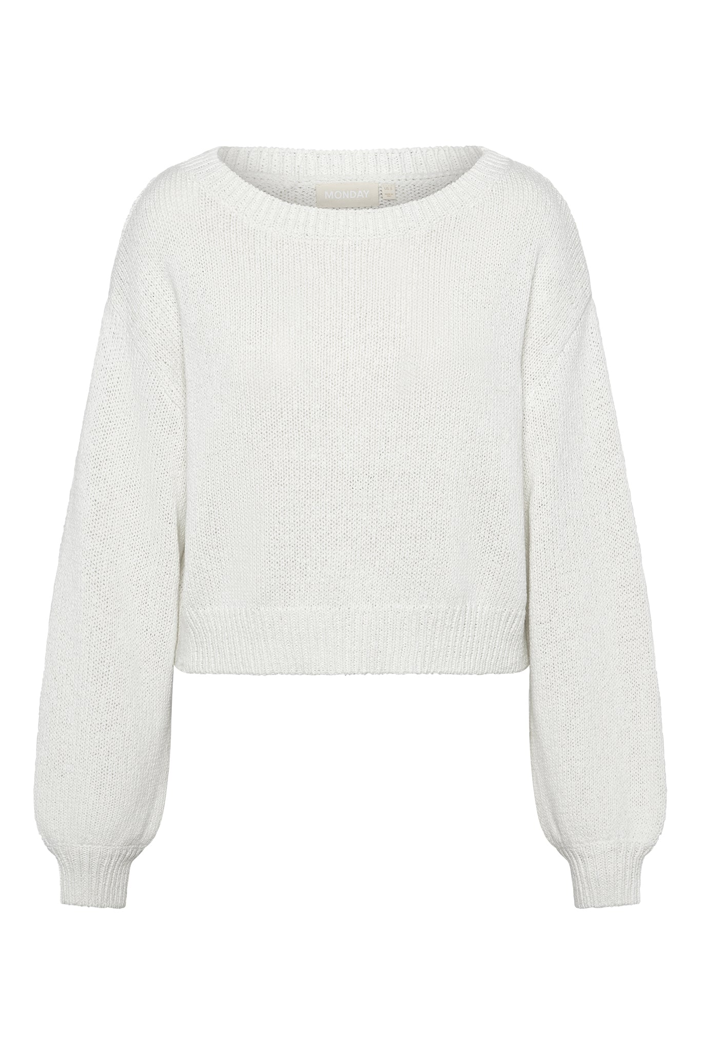 White knit crewneck sweater with dropped shoulders and ribbed hem and cuffs; neck label reads MONDAY.