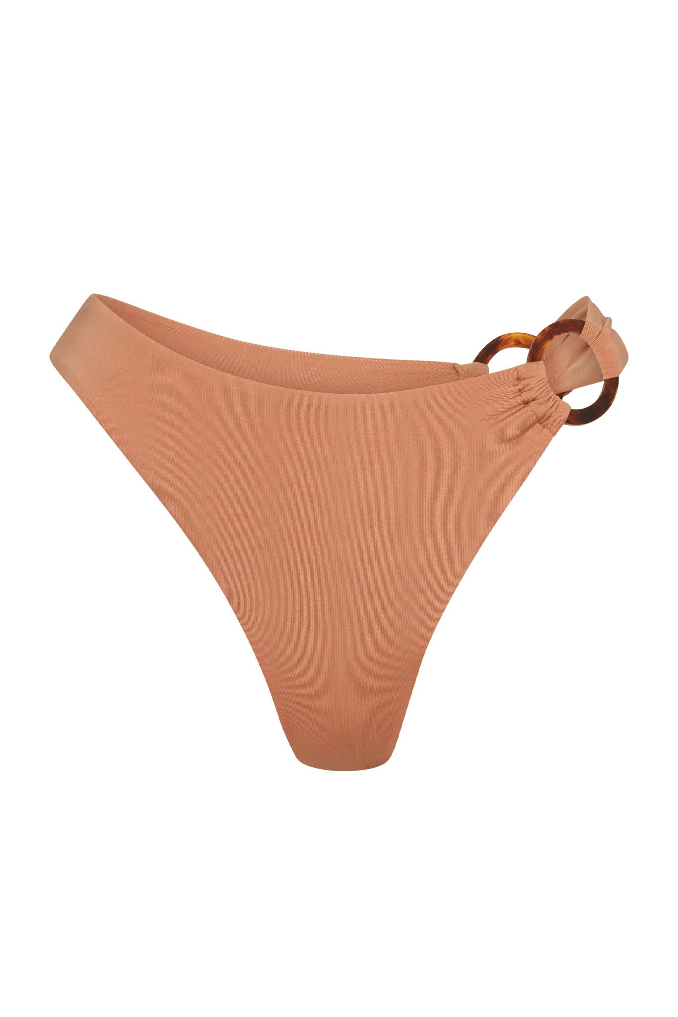 High-cut tan swim bottoms with tortoiseshell ring detail at left hip.