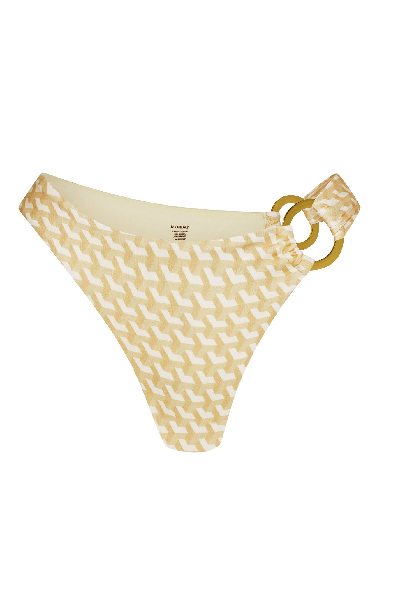 Beige geometric-print bikini bottom with double gold-ring detail at right hip and "MONDAY" label inside.
