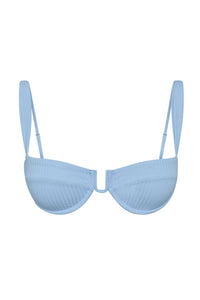 Front view of Cala Roja Top in sky rib with underwire cups, U-shaped center and adjustable straps on white background