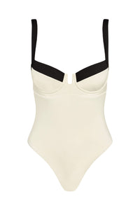Front view of Clovelly One Piece in ivory and black showcasing underwire cups and shoulder straps on white background