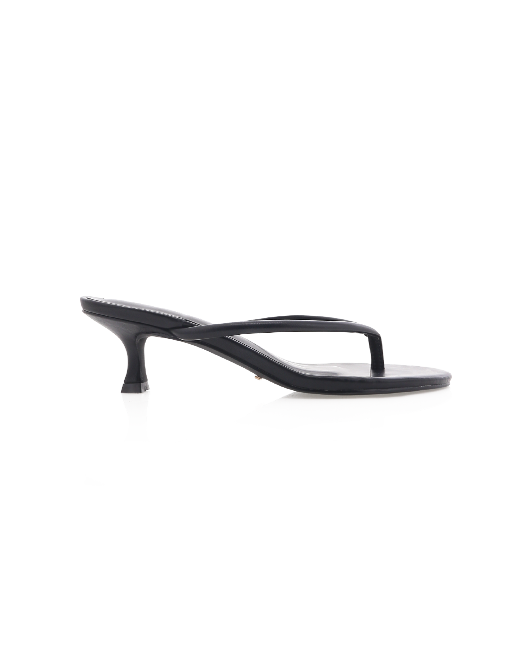 Black low-heeled thong sandal photographed in profile on a white background