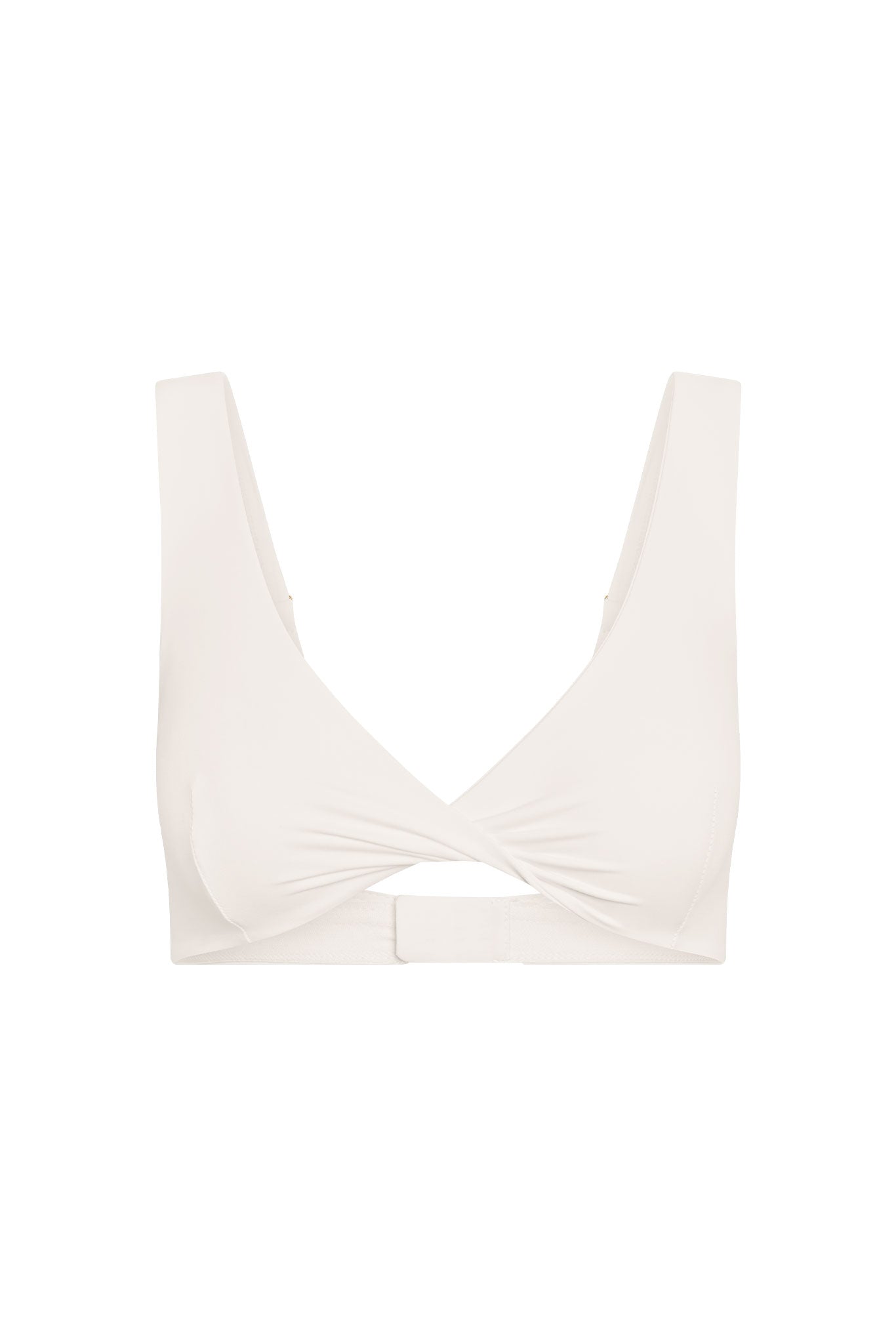 Cream crossover-front wireless bra with wide straps and hook-and-eye back closure.