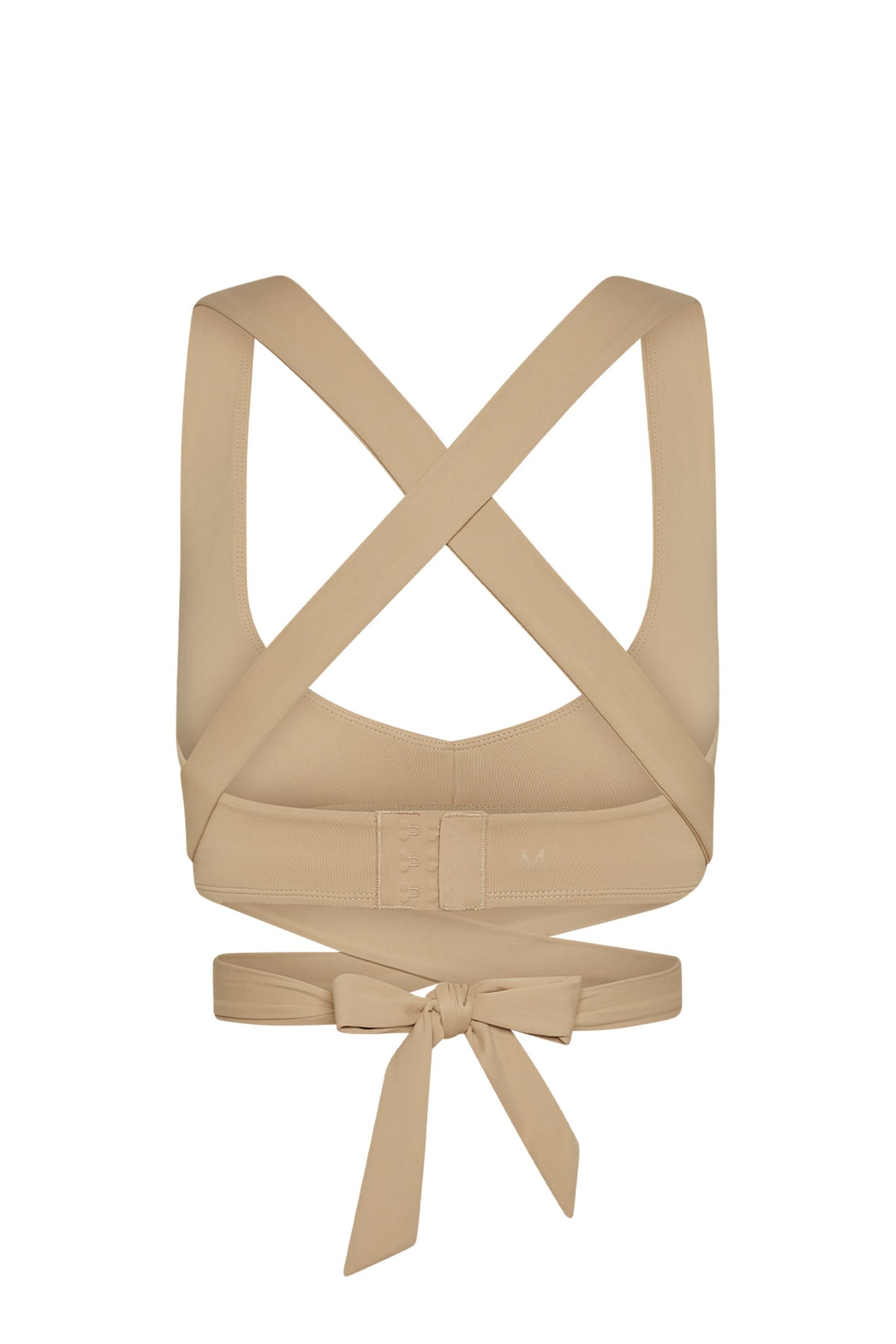 Beige crisscross posture-correcting wrap bra with tied bow back, size label M visible