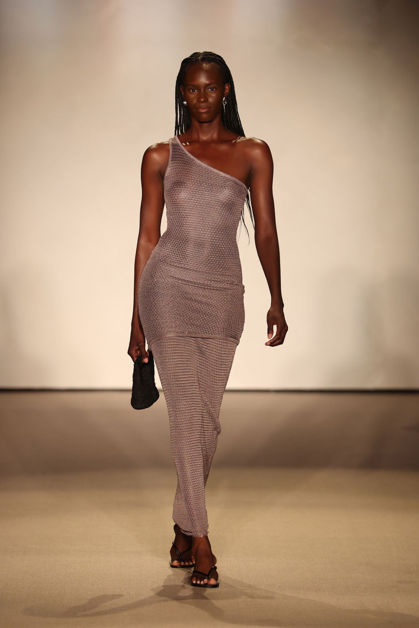 Front view of Fontelina Skirt in steel treble knit on model, slim ribbed knit fit against neutral runway background
