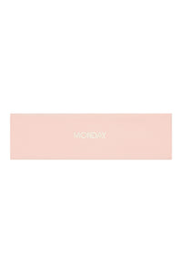 Flat lay of Monday Headband in Heather Powder Pink showcasing centered embroidered “MONDAY” logo on white background