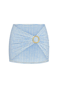 Front view of Jamaica Sarong in sky gingham showcasing gathered fabric and circular gold-tone buckle on a white background