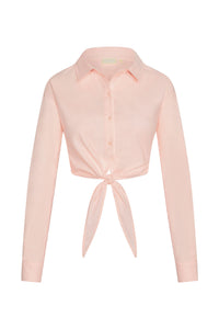 Front view of La Jolla tie shirt in powder pink showing cropped tie-front knot, button placket and sleeves on white