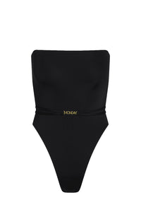Front view of Miami One Piece Black showcasing the strapless bandeau and detachable gold MONDAY belt on a white background