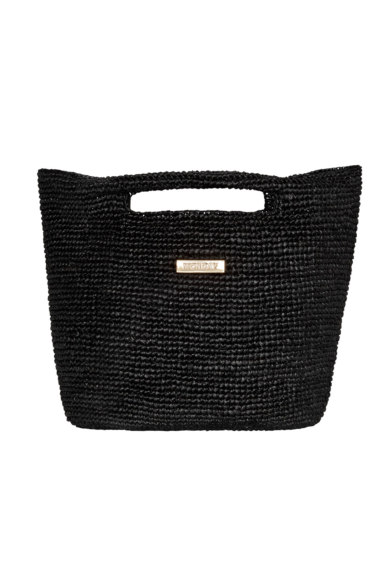Black woven tote bag with cutout top handle and small gold plaque reading MONDAY.