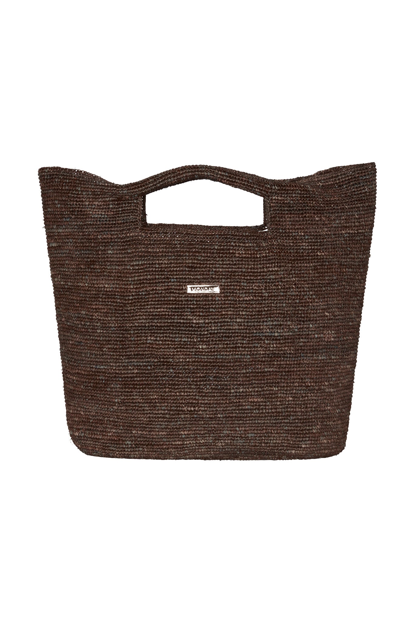 Brown woven tote bag with cutout top handles and small metal label reading MONDAY.