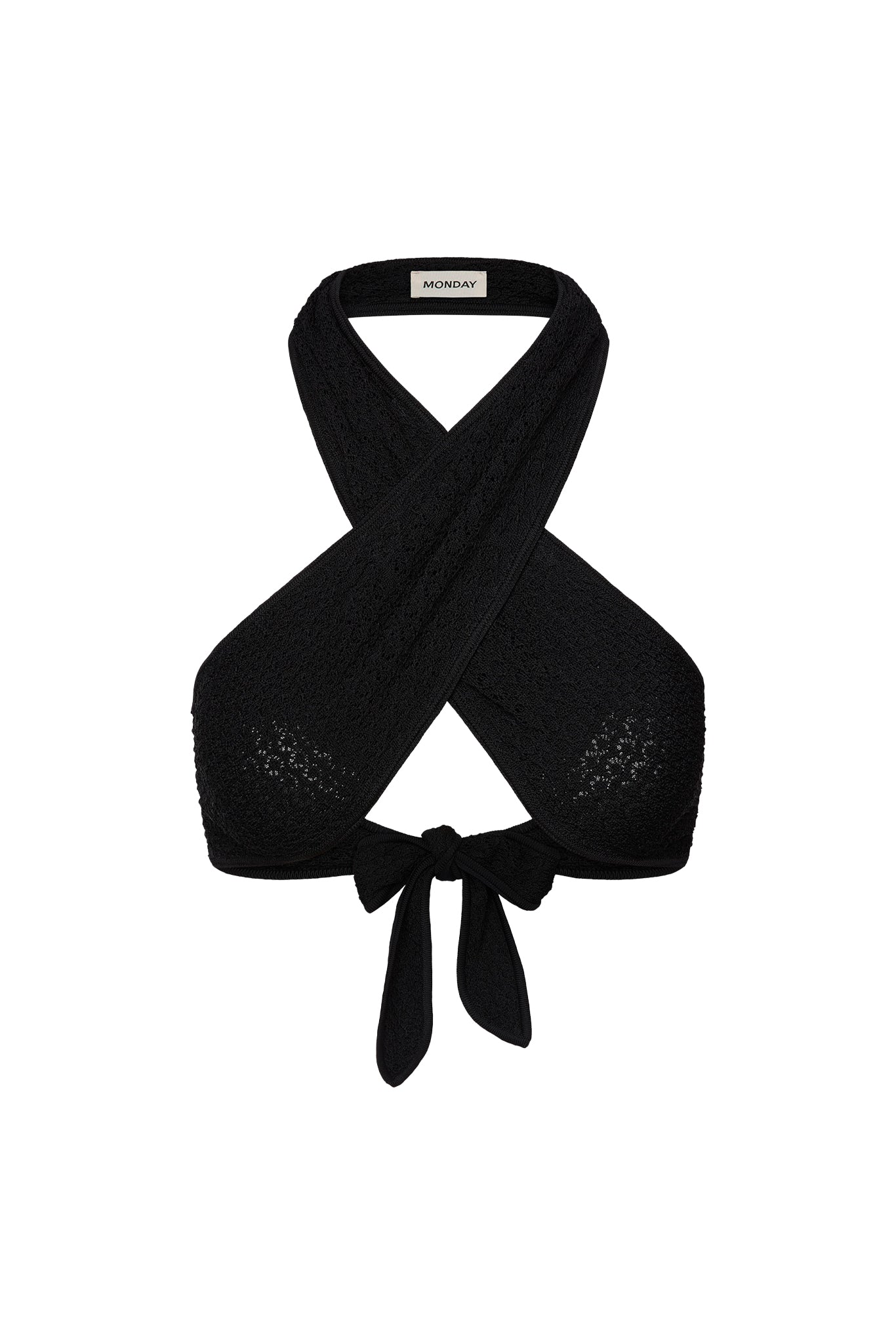 Front view of Ramatuelle Top in Black Lace Crochet showing crossed halter straps, wrap tie front and lace texture on white