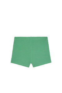 Front view of kids’ Santa Cruz shorts in pond green showing crinkle texture and elastic waistband on white background