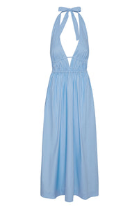 Front view of Santa Cruz dress in sky blue showing plunging halter V-neck with tie, elastic underbust, and ankle-length skirt on white background