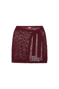 Front view of Santa Marta sarong in deep burgundy petit crochet with openwork design on white background