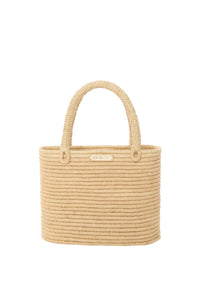 Front view of Valencia small woven raffia bag showing structured body, gold MONDAY logo plate, and rope handles on white background