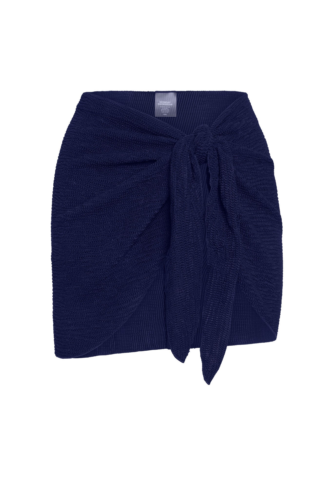 Navy knit sarong-style wrap skirt with front tie; tag reads "MONDAY SWIMWEAR".