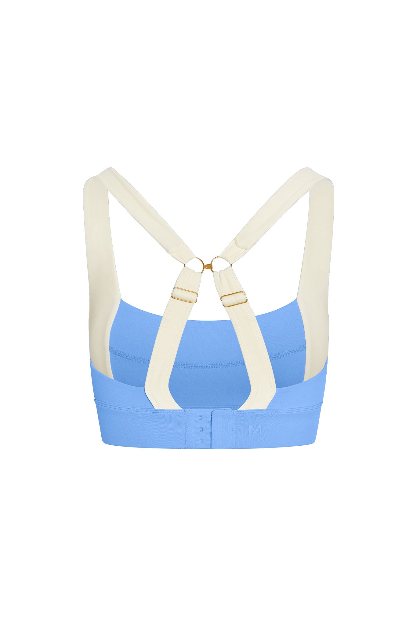 Back of sky-blue sports bra with cream adjustable racerback straps, center hook-and-eye closure and embossed 'M' on band