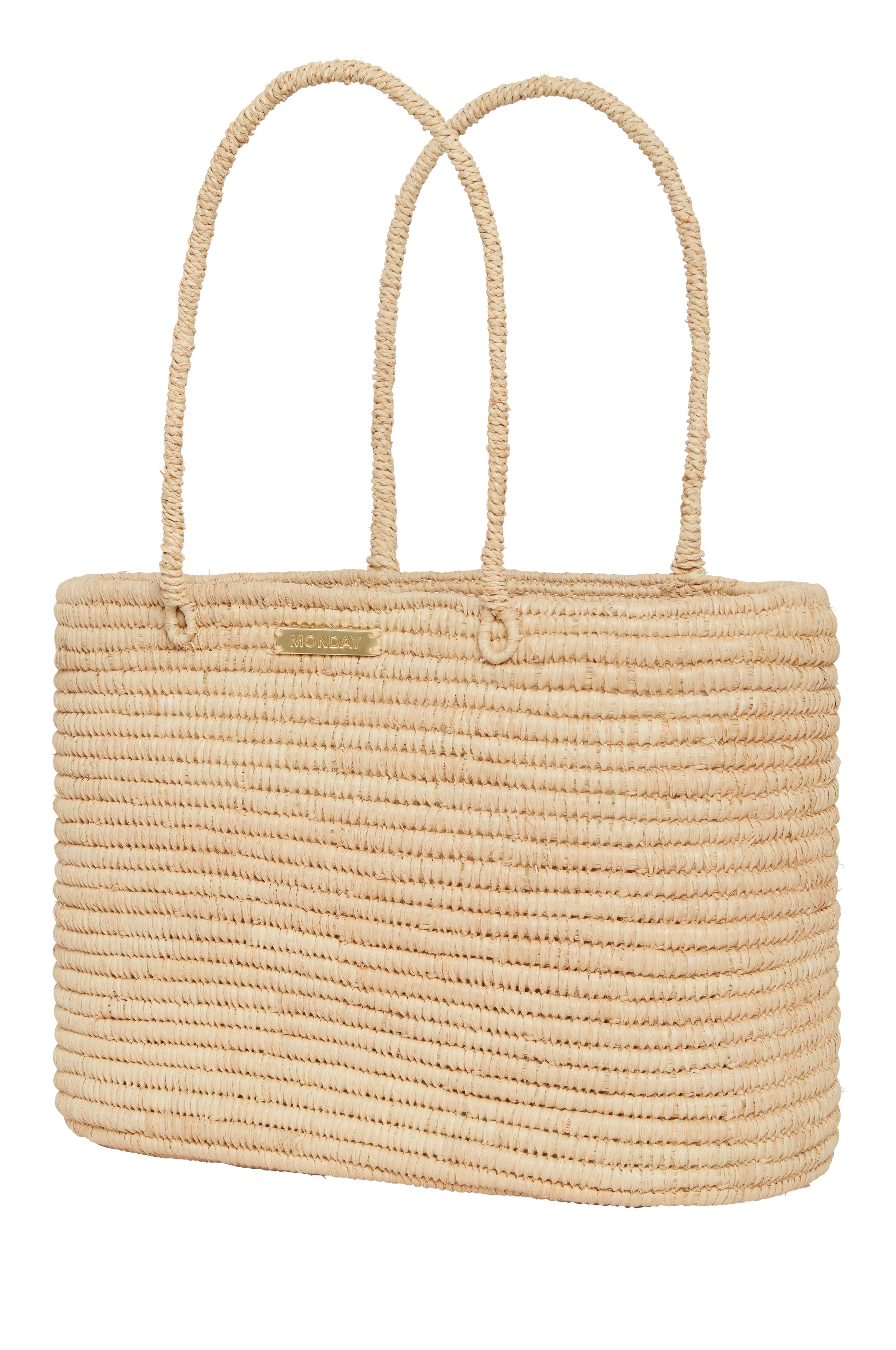 Beige woven straw tote bag with two tall loop handles and gold nameplate reading MONDAY