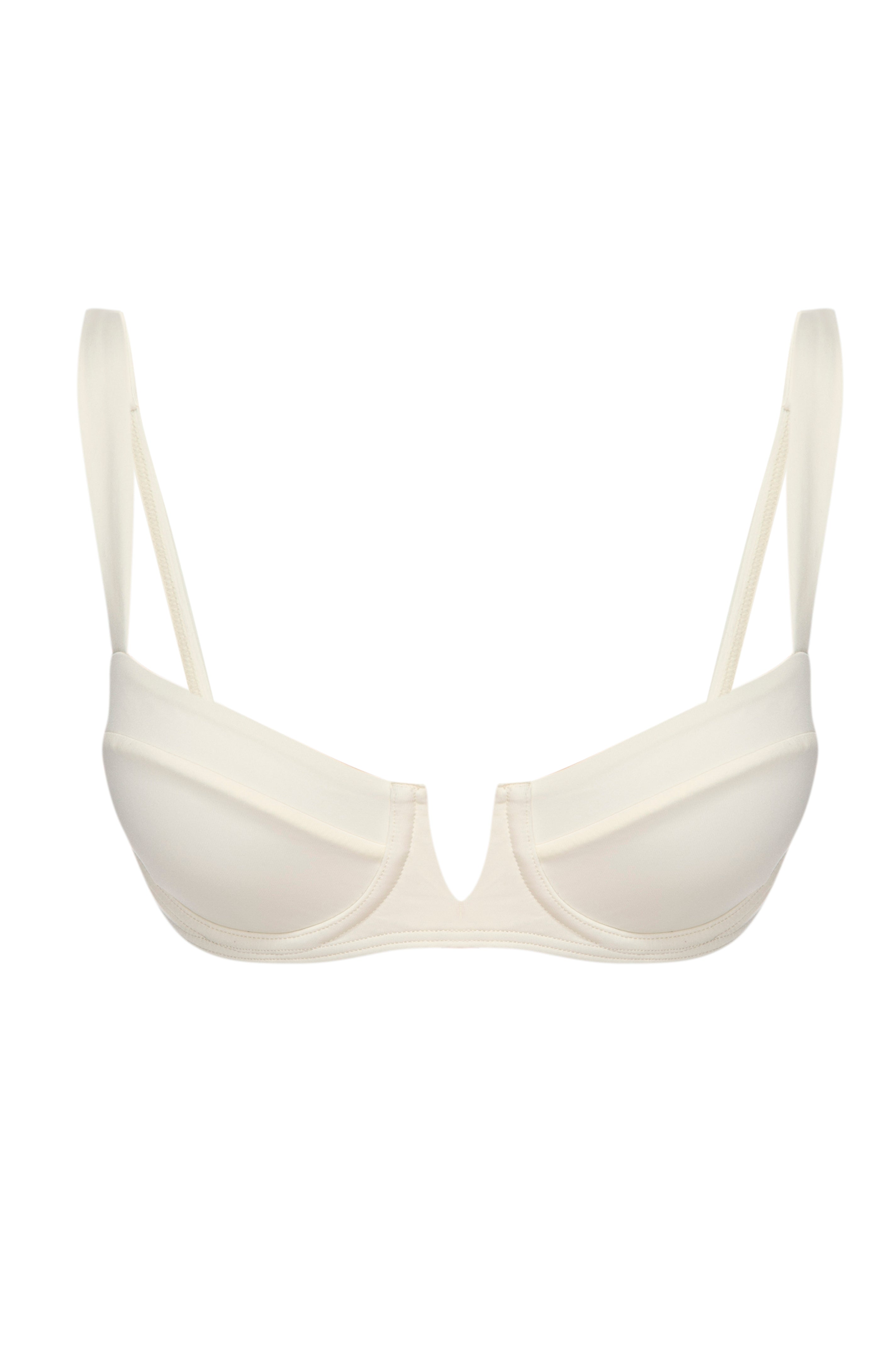 Cream underwire plunge bra with thin adjustable straps, front view